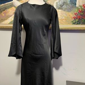 Beautiful and elegant Choklate Paris dress, black color, long sleeve, satin.